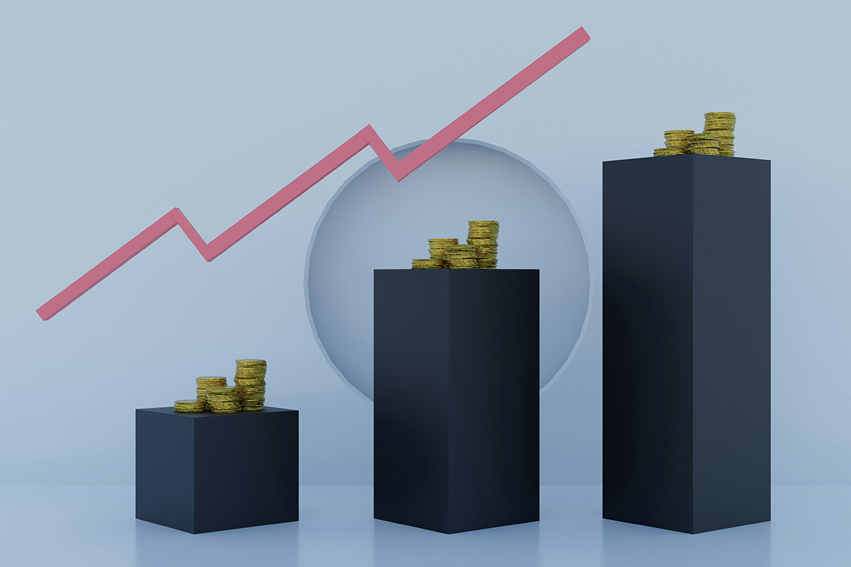 An illustration of three increasing size columns with coins stacked on top. A red arrow tracking upwards is above them